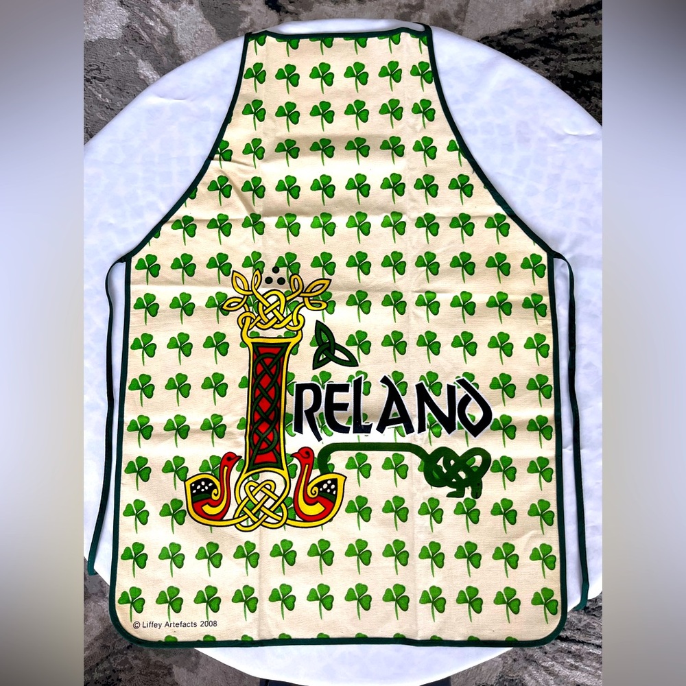 Irish Apron features Celtic Knot “I” with shamrocks off white cotton green trim